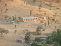 Office, school and toilets - photo taken from Bandiagara Escarpment Office, school and toilets - photo taken from Bandiagara Escarpment