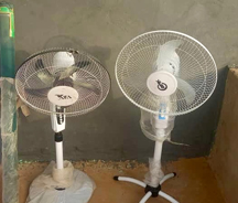 Two fans to help keep the room cool