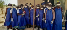 The group wearing safety garments The group wearing safety garments